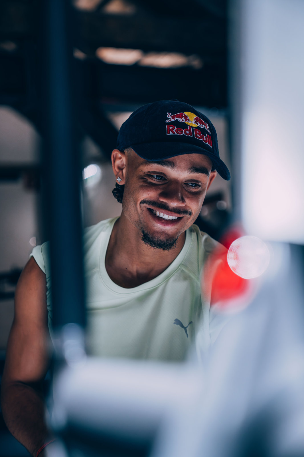 Xavi Simons smiling in a Red Bull cap